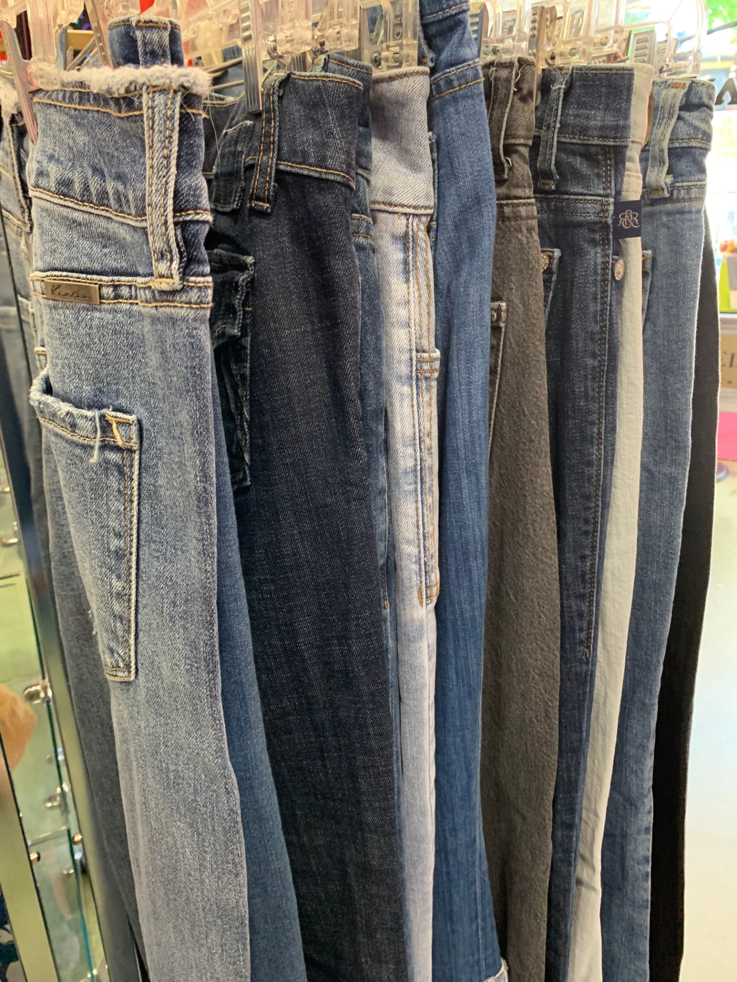 Rack of jeans in assorted washes