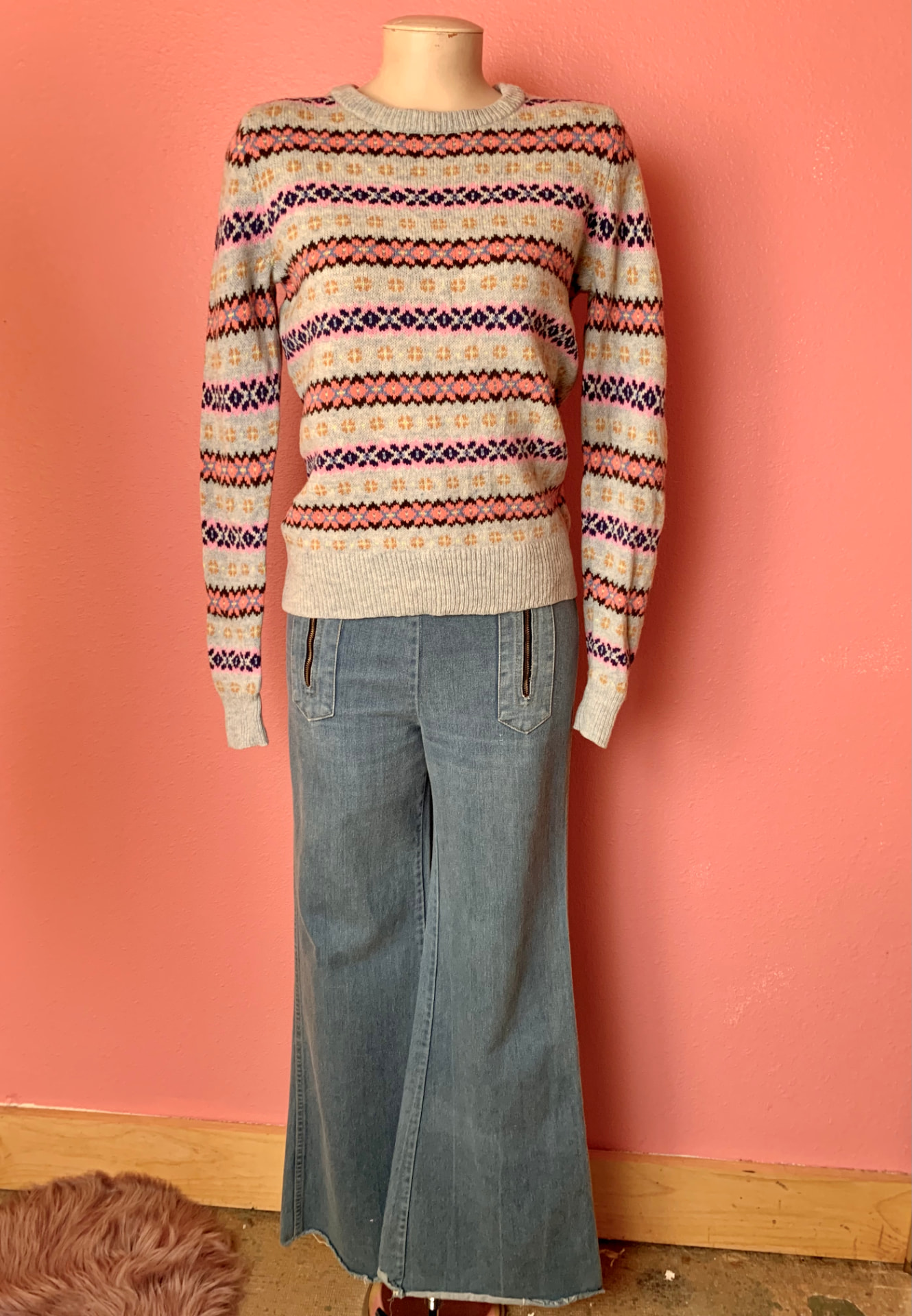 Fair isle striped sweater with wide-leg flared jeans